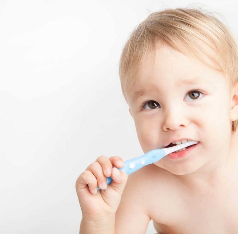 Baby brushing teeth