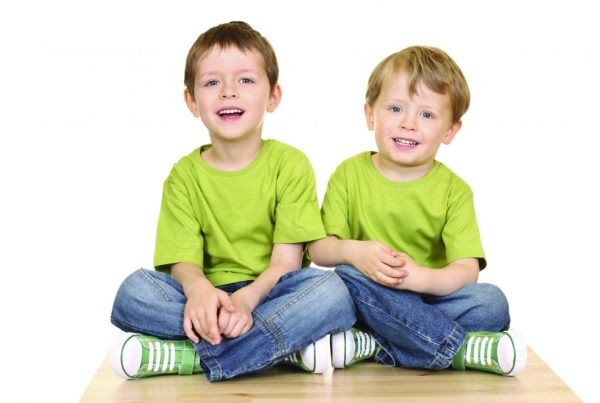 Two smiling toddlers